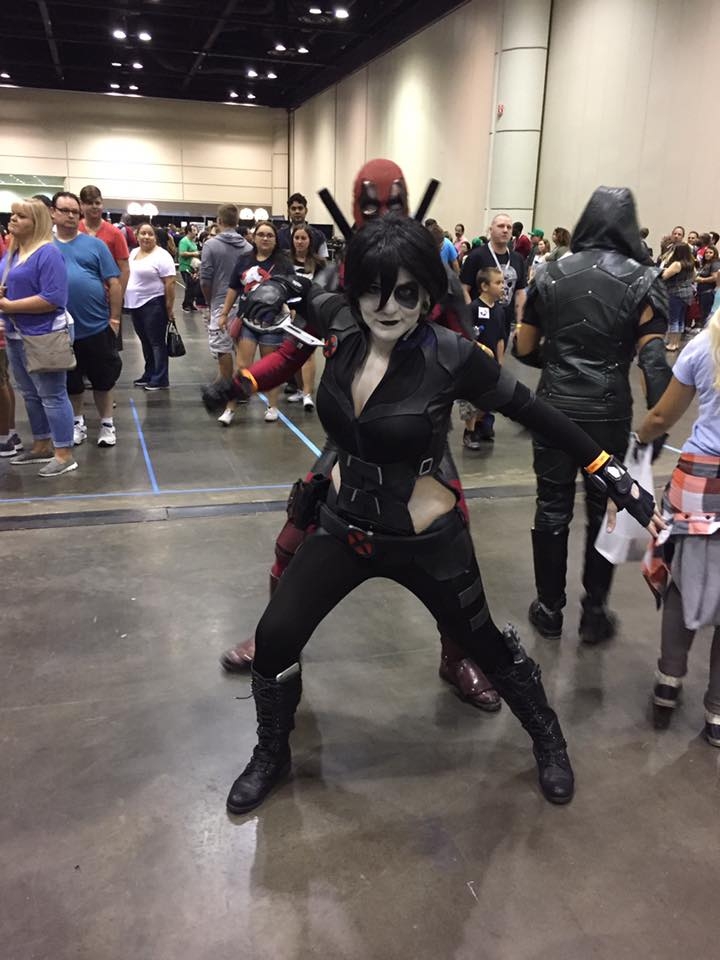 CosView Halloween Marathon:: Domino look BAD ASS with a Deadpool making the bunny ear behind her.. but who is she??